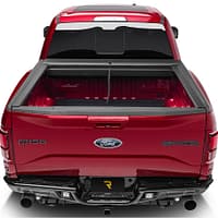 1c89ad1afc58f711e63bc30631643901 Roll-N-Lock retractable truck bed cover installed on a custom truck at Accessory World Customs in Miami