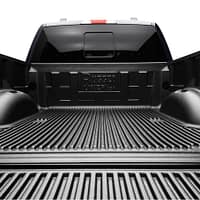 8ed73e088d607a07a1461b99f4686c0a Rugged Liner custom-molded truck bed liner installed on a pickup truck at Accessory World Customs in Miami