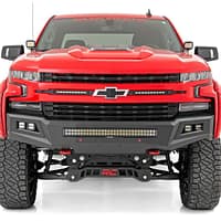 Red Chevy with Custome Grill Custom red Chevy truck with heavy duty bull bar, integrated LED lights, and off-road tow hooks in Miami FL