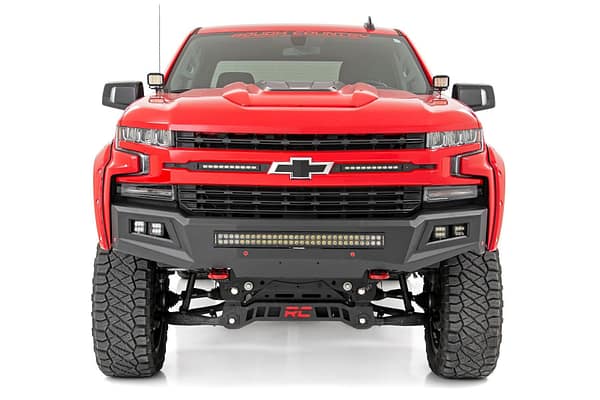 Red Chevy with Custome Grill Custom red Chevy truck with heavy duty bull bar, integrated LED lights, and off-road tow hooks in Miami FL