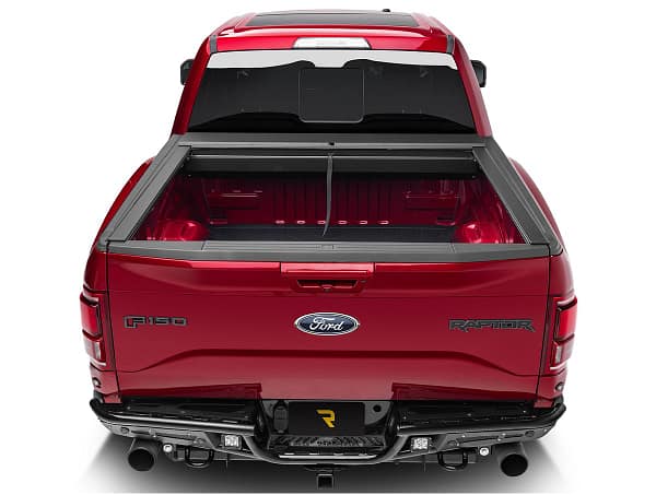 1c89ad1afc58f711e63bc30631643901 Roll-N-Lock retractable truck bed cover installed on a custom truck at Accessory World Customs in Miami
