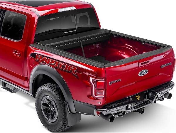 474186957d53ffbc7e1437c3f805e269 Roll-N-Lock retractable truck bed cover installed on a custom truck at Accessory World Customs in Miami