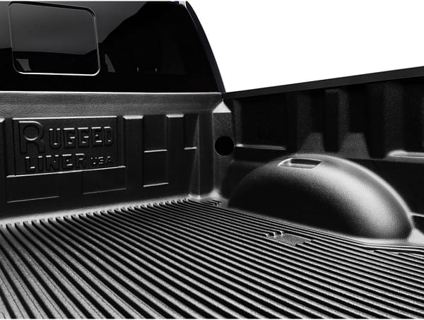 d68f09147d5e150361a44b11d4a7cb1a Rugged Liner custom-molded truck bed liner installed on a pickup truck at Accessory World Customs in Miami