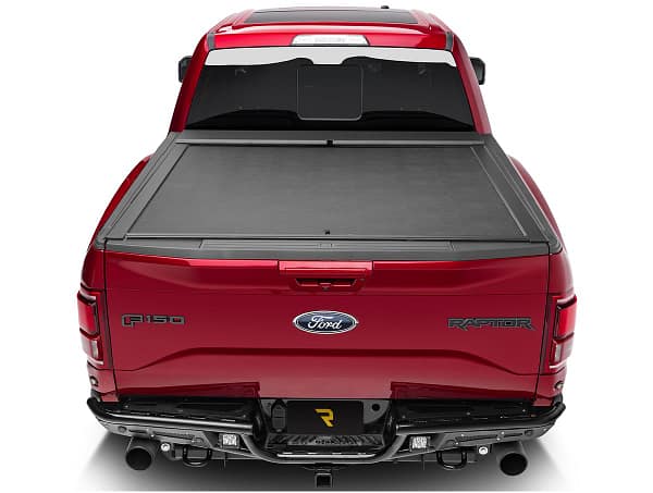 f02a27cac1706e502ed70e848d9e06f4 Roll-N-Lock retractable truck bed cover installed on a custom truck at Accessory World Customs in Miami